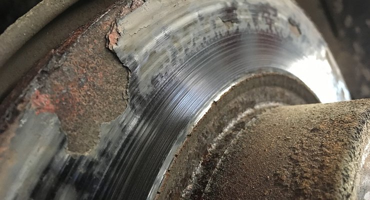 What is the danger of rust on car brake discs?