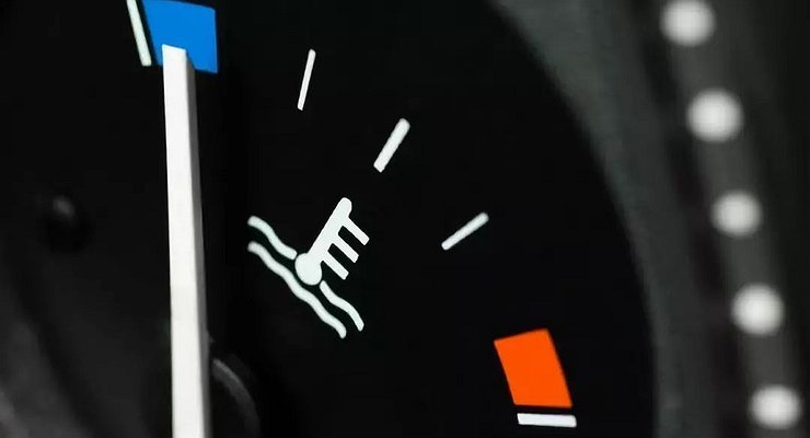 What is the danger of driving with a cold engine?
