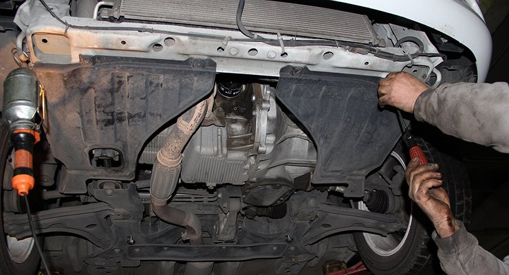 What serious consequences can a torn motorcycle cover or fender liner lead to?