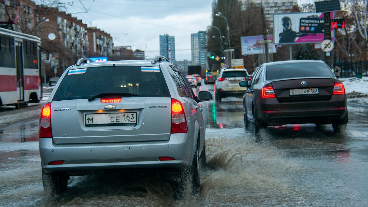 Why do seasoned car owners try to drive a car through deep puddles in the spring