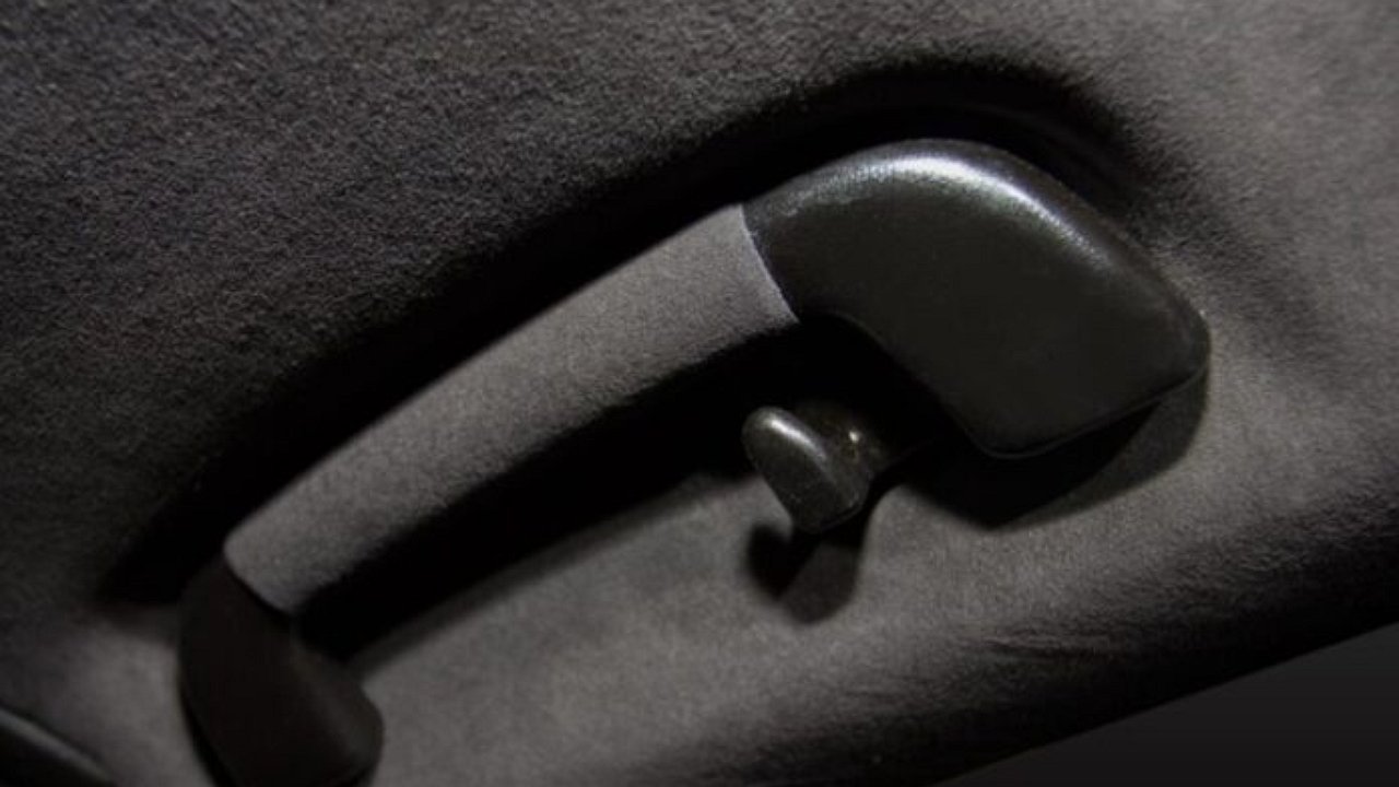 Why is there a lever on the ceiling to the left of the driver in the car