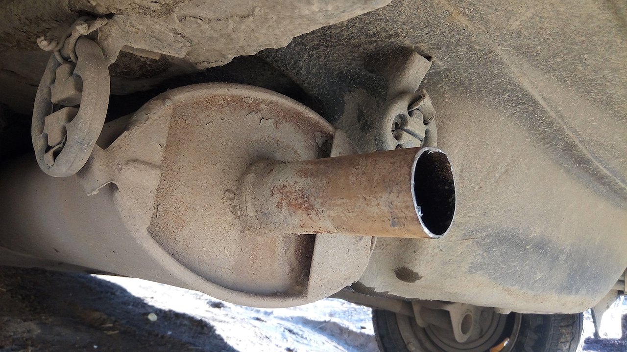 Why does the smell of exhaust suddenly appear in the interior of a used car