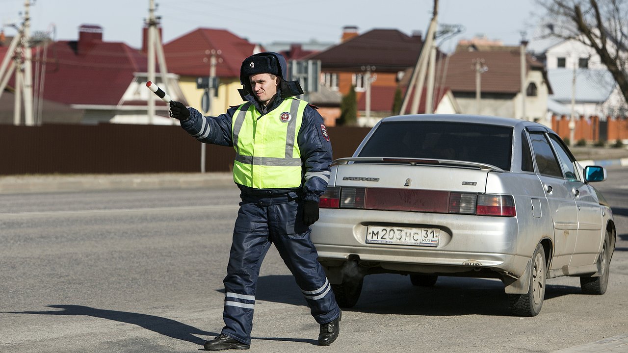 In the absence of what documents, the traffic police actually stopped fining drivers