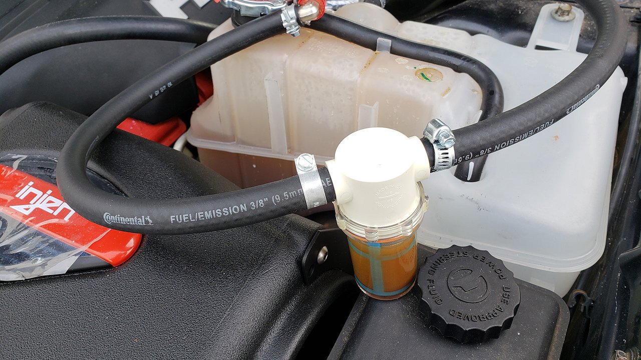 Why do some drivers install an antifreeze filter in their car?