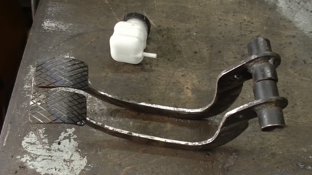 Why do some motorists retrofit a car with a second brake pedal?