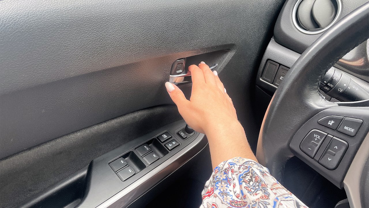 Why in Europe novice drivers are taught to open the door with the right hand