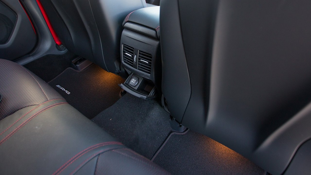 Why do the interiors of many cars have an uneven floor at the back?