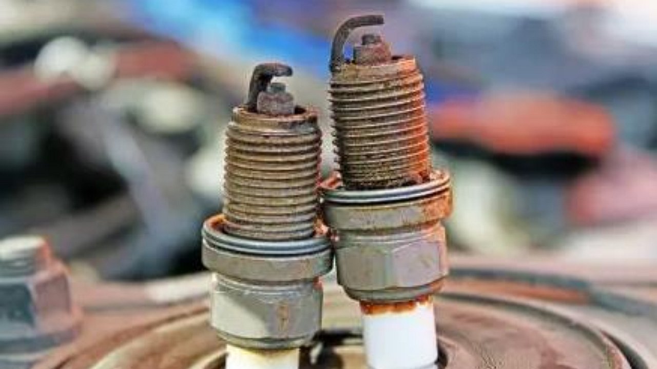 Why experienced car mechanics never throw away old spark plugs
