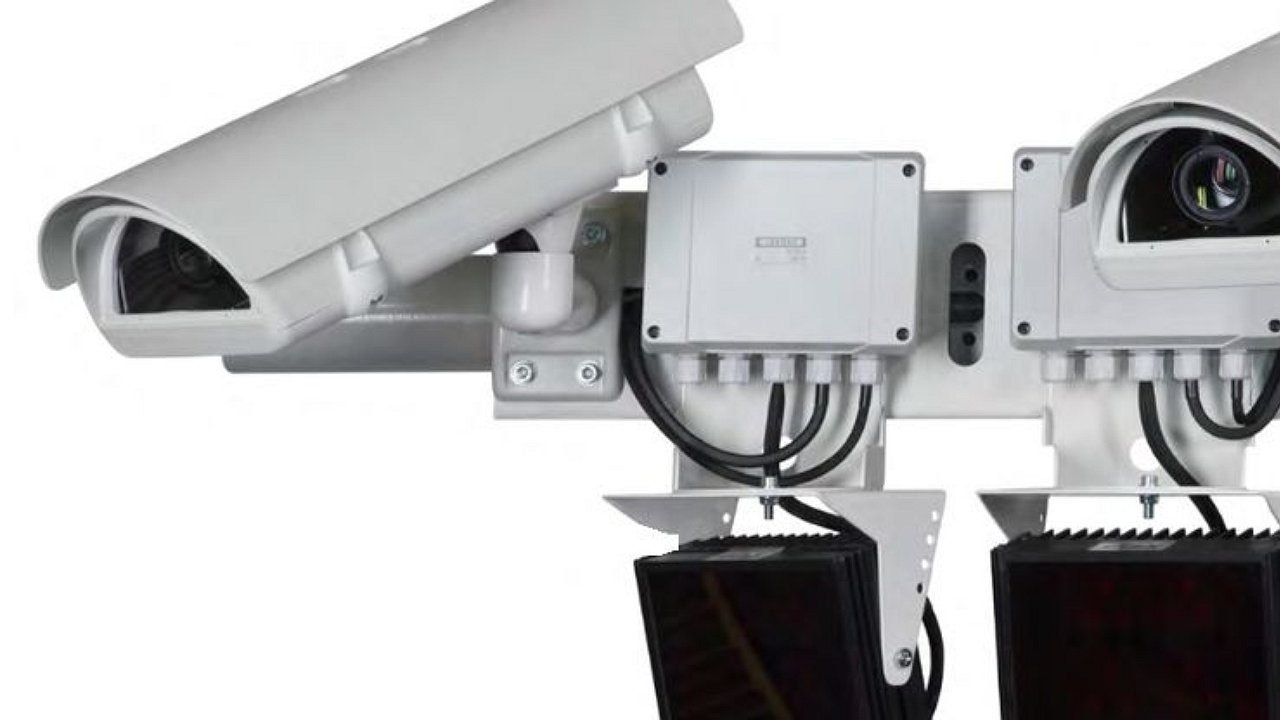 Why do traffic police cameras selectively fine drivers at night?