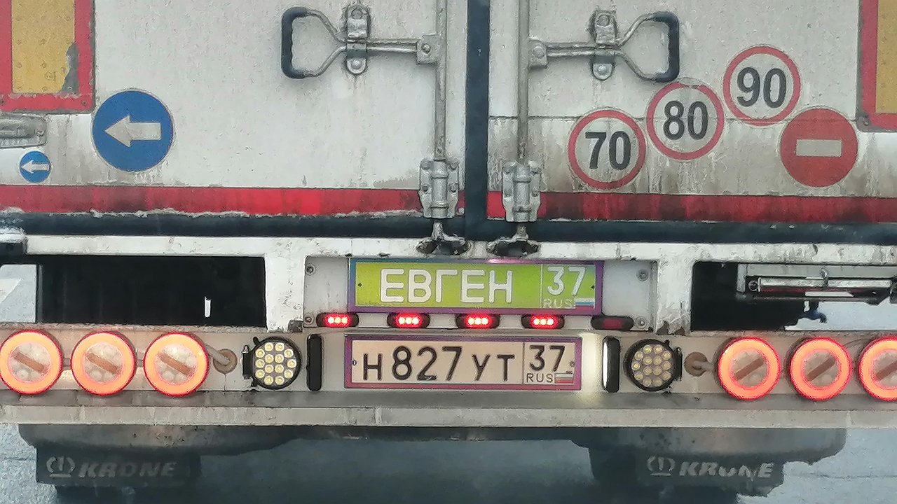 Why do truck drivers hang a ‘second license plate’ on the back?