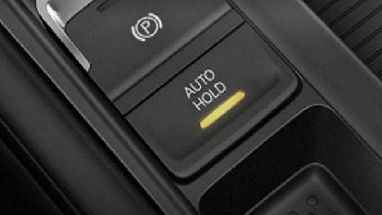What actually happens if you activate the electronic parking brake while driving?
